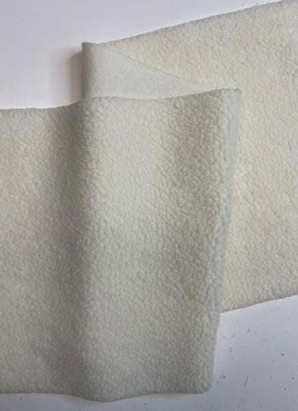 Tessuto pecorella panna