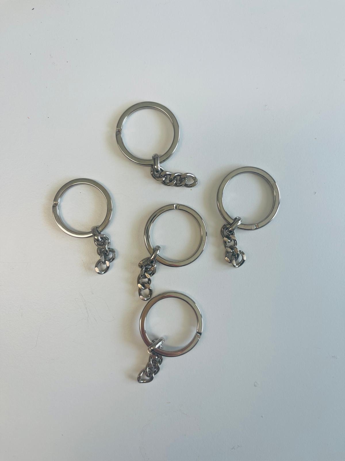 Anello in Acciaio con Catenella